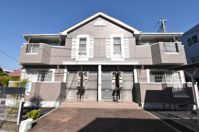 ��ʌ������s�������̃A�p�[�g�̌����O��