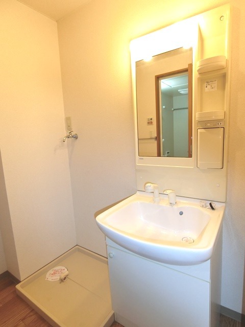 ��ʌ��@�c�s�@�c�R���ڂ̃}���V�����̐��ʏ�