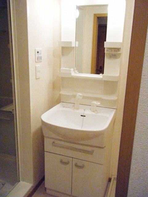 ��ʌ��������܎s��΋撇���P���ڂ̃}���V�����̐��ʏ�