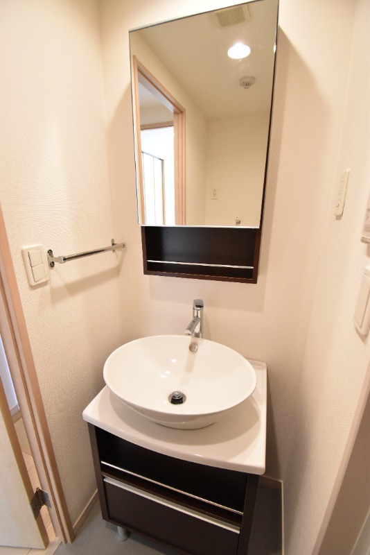 ��ʌ�����s����S���ڂ̃}���V�����̐��ʏ�