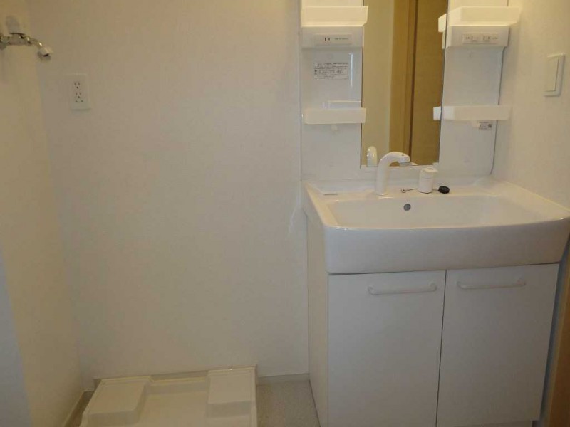 ��ʌ�����s�厚���s���̃A�p�[�g�̐��ʏ�