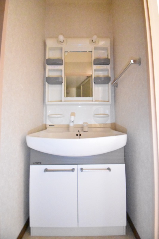 ��ʌ������s�����R���ڂ̃A�p�[�g�̐��ʏ�