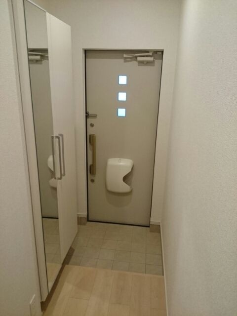 ��ʌ��k�����S�ɓޒ������R���ڂ̃A�p�[�g�̌���