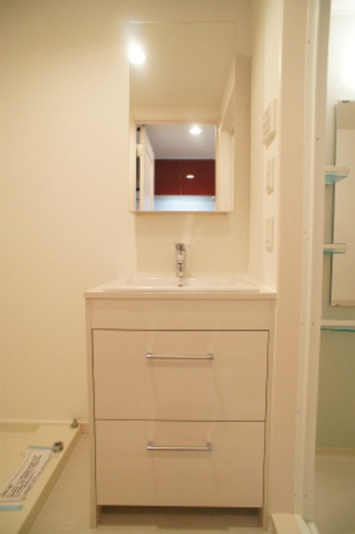 ��ʌ��������܎s��{����ؒ��P���ڂ̃}���V�����̐��ʏ�