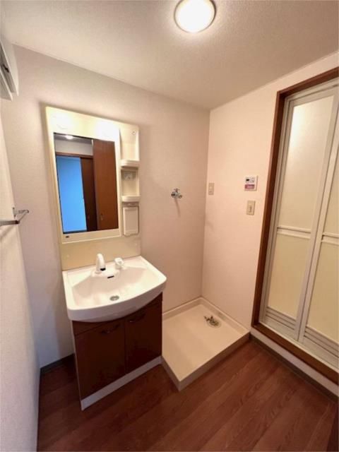 ��ʌ�����s�厚������̃}���V�����̐��ʏ�