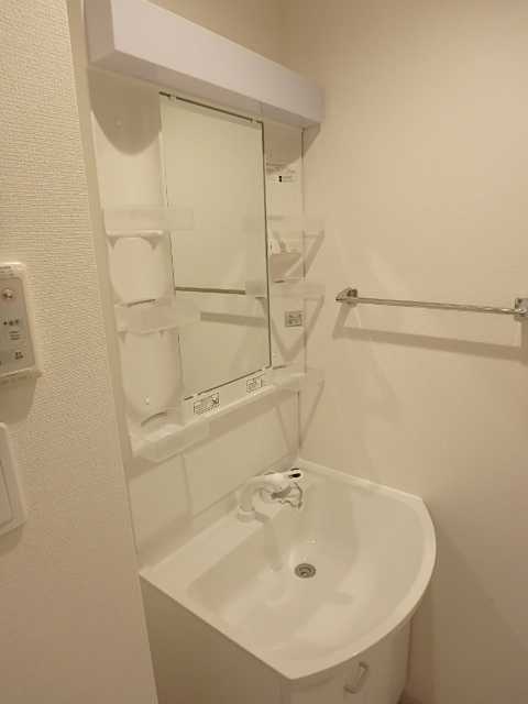 ��ʌ��������܎s��{����ؒ��S���ڂ̃}���V�����̐��ʏ�