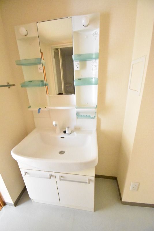 ��ʌ������s�����R���ڂ̃}���V�����̐��ʏ�