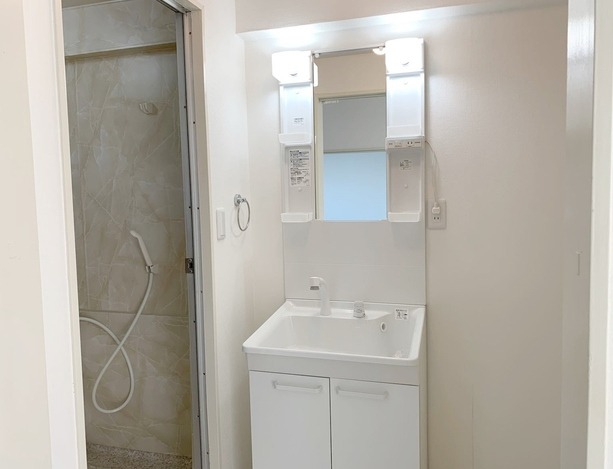 ��ʌ��������܎s�΋擌�Y�a�V���ڂ̃}���V�����̐��ʏ�