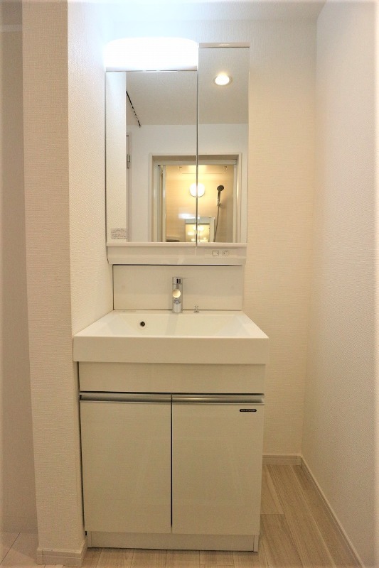 ��ʌ�����s�k�����̃A�p�[�g�̐��ʏ�