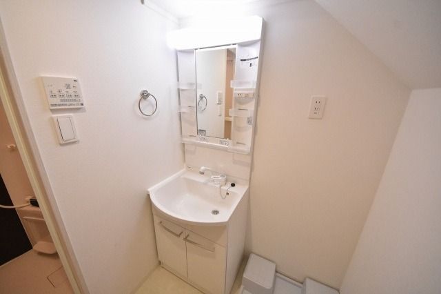 ��ʌ��������܎s����{�O���̃A�p�[�g�̐��ʏ�