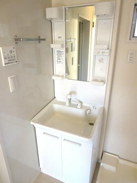 ��ʌ�����s�厚�����̃A�p�[�g�̐��ʏ�