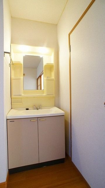 ��ʌ��k�����S�ɓޒ����S���ڂ̃}���V�����̐��ʏ�