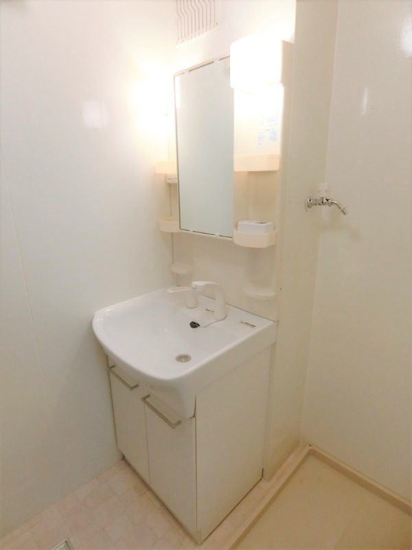 ��ʌ������s�����R���ڂ̃A�p�[�g�̐��ʏ�