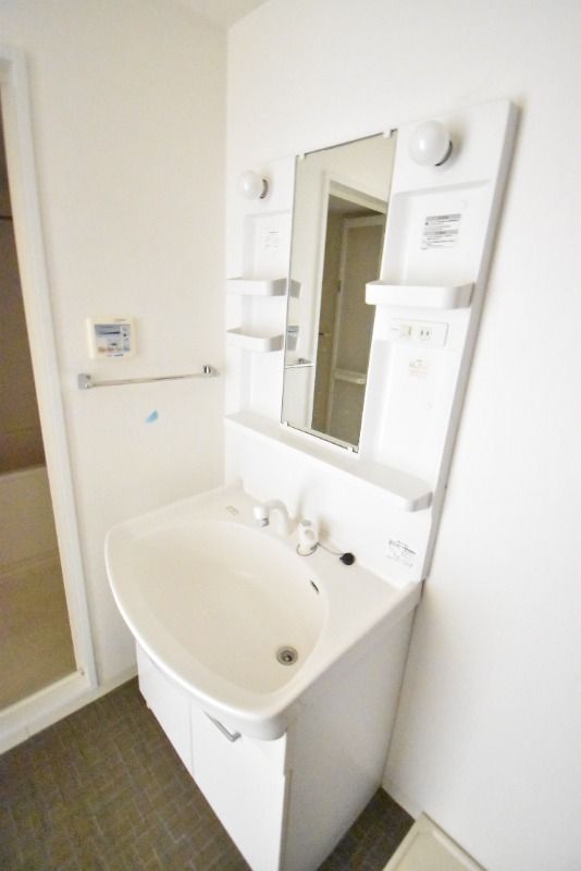 ��ʌ�����s�˒˓�P���ڂ̃}���V�����̐��ʏ�