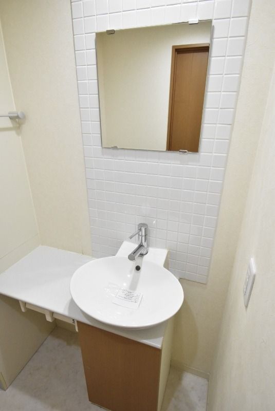 ��ʌ��������܎s��{��O���Q���ڂ̃}���V�����̐��ʏ�