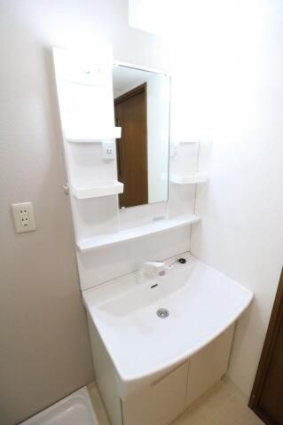 ��ʌ��������܎s�k��y�C���Q���ڂ̃}���V�����̐��ʏ�