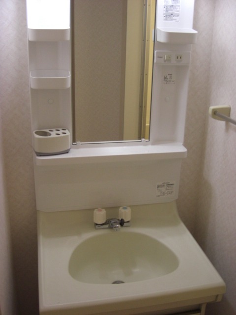 ��ʌ�����s������U���ڂ̃A�p�[�g�̐��ʏ�