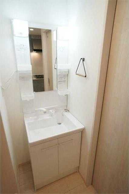 ��ʌ��������܎s�k����i���Q���ڂ̃A�p�[�g�̐��ʏ�