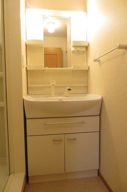 ��ʌ������s�V�����X���ڂ̃A�p�[�g�̐��ʏ�