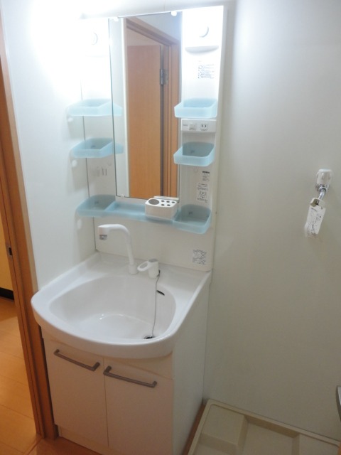 ��ʌ��������܎s��{��㏬���̃A�p�[�g�̐��ʏ�