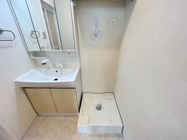 ��ʌ�����s�厚�����̃A�p�[�g�̐��ʏ�