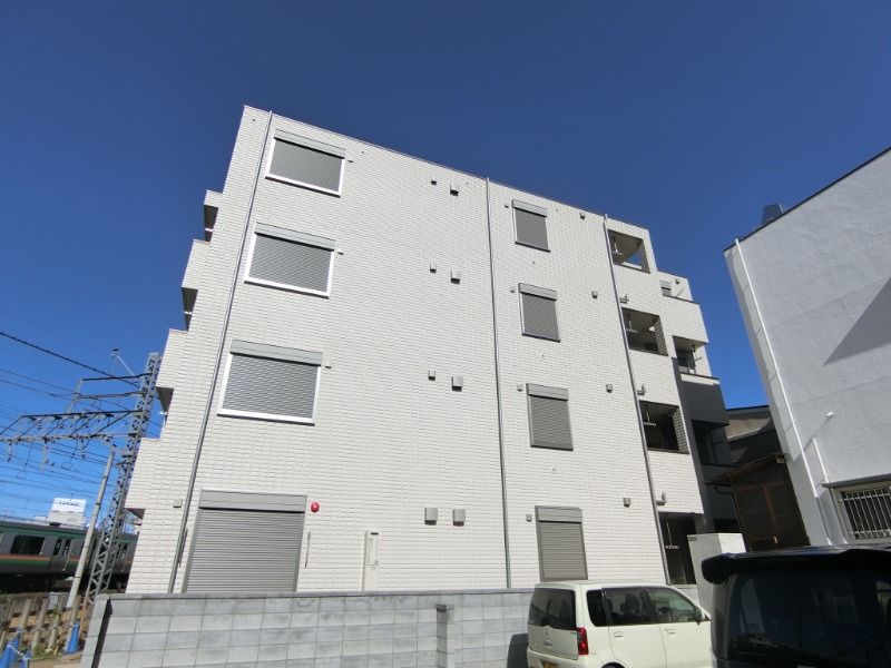 ��ʌ��������܎s��{��y�蒬�R����157�̃}���V�����̌����O��