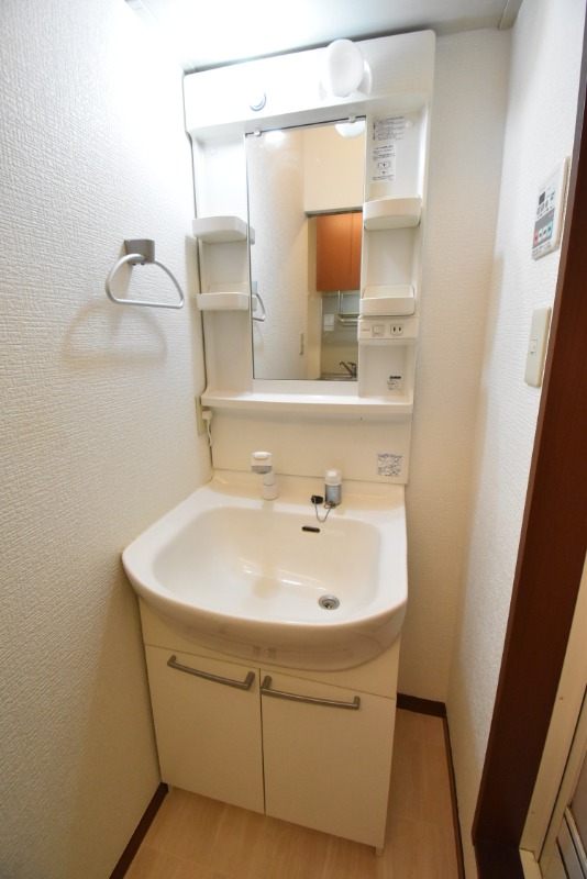 ��ʌ��������܎s��{�捂�@���R���ڂ̃A�p�[�g�̐��ʏ�