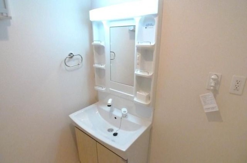 ��ʌ�����s�厚�����̃A�p�[�g�̐��ʏ�