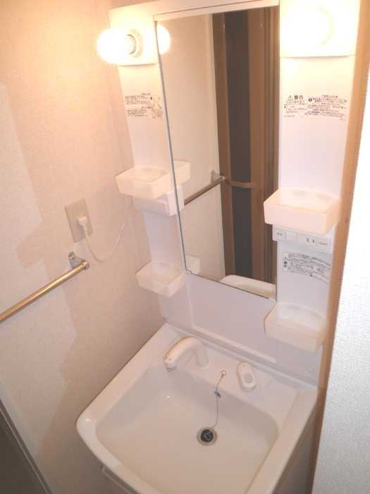 ��ʌ��������܎s�k����i���Q���ڂ̃A�p�[�g�̐��ʏ�