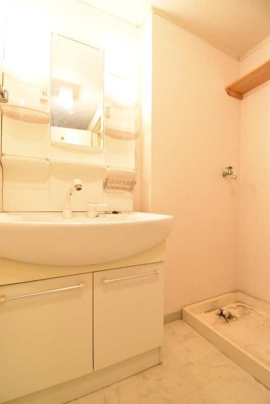 ��ʌ��������܎s�k����i���Q���ڂ̃A�p�[�g�̐��ʏ�