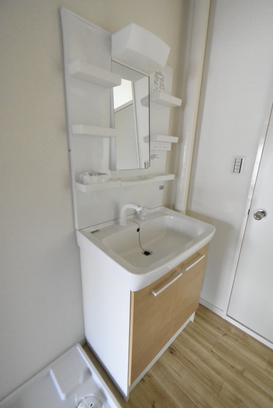 ��ʌ��@�c�s�@�c�P���ڂ̃}���V�����̐��ʏ�