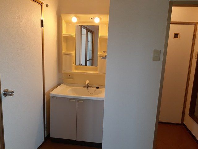 ��ʌ�����s���ԂR���ڂ̃}���V�����̐��ʏ�