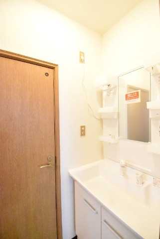 ��ʌ�����s�˒˓��R���ڂ̃}���V�����̐��ʏ�