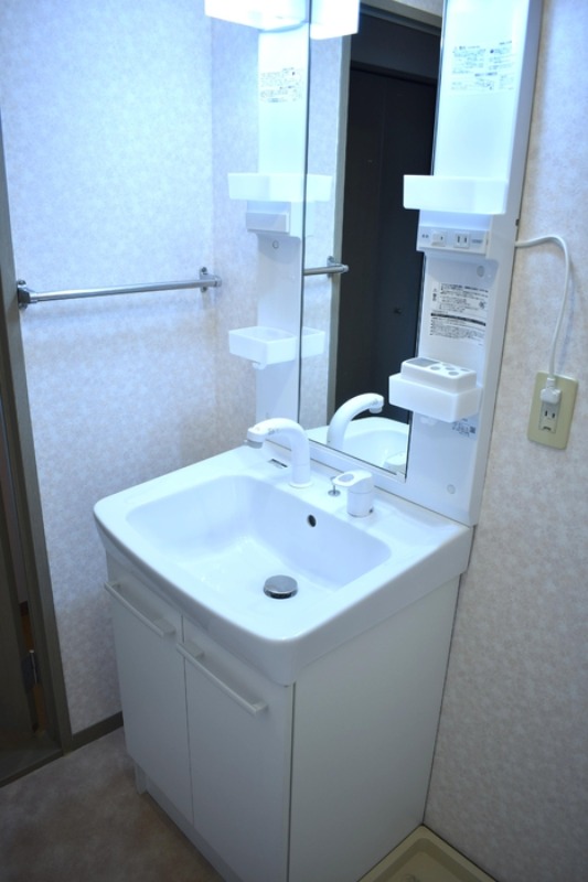 ��ʌ��������܎s����厚����{���̃A�p�[�g�̐��ʏ�