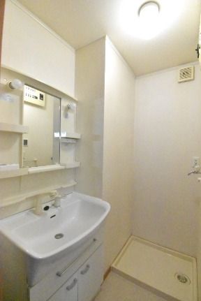 ��ʌ������s�������̃A�p�[�g�̐��ʏ�