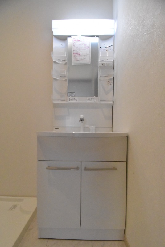 ��ʌ��������܎s��{��g�~���R���ڂ̃A�p�[�g�̐��ʏ�