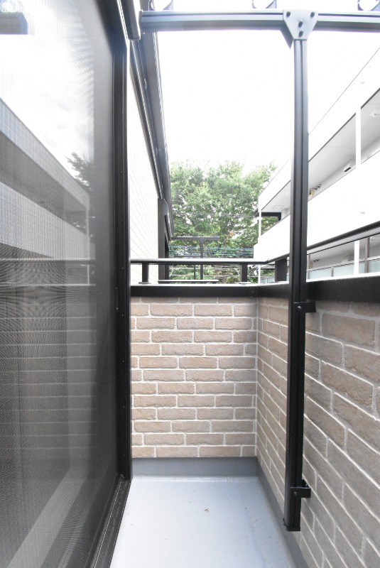 ��ʌ��������܎s��{��g�~���R���ڂ̃A�p�[�g�̃o���R�j�[