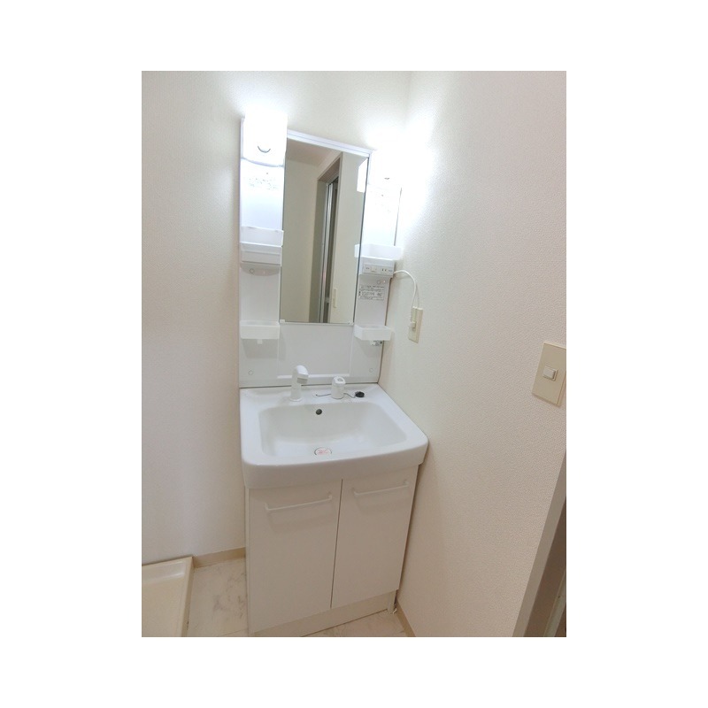 ��ʌ��@�c�s�@�c�P���ڂ̃}���V�����̐��ʏ�