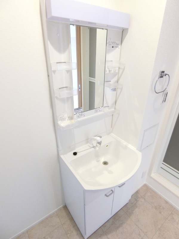 ��ʌ��k�����S�ɓޒ������P���ڂ̃}���V�����̐��ʏ�