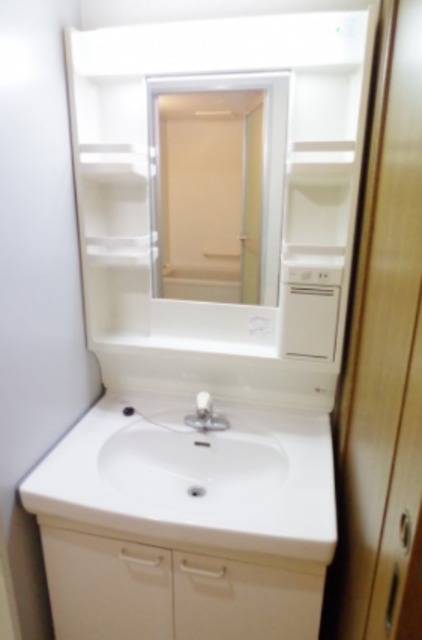 ��ʌ�����s�˒˂R���ڂ̃}���V�����̐��ʏ�