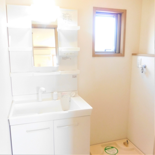 ��ʌ�����s�厚�����̃A�p�[�g�̐��ʏ�