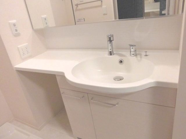 ��ʌ��������܎s�Y�a�擌�����̃A�p�[�g�̐��ʏ�