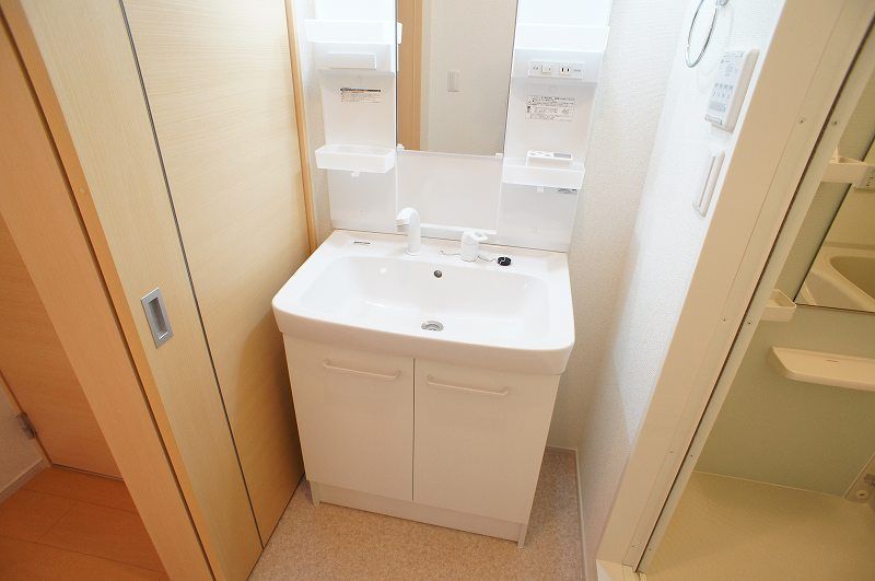 ��ʌ�����s�厚���s���̃A�p�[�g�̐��ʏ�