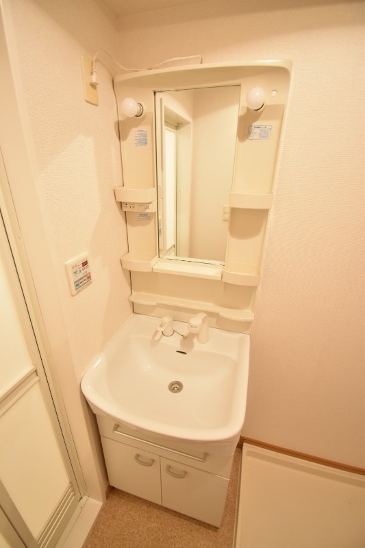 ��ʌ��@�c�s���P���ڂ̃}���V�����̐��ʏ�