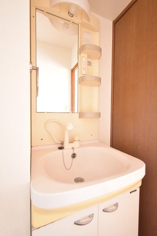 ��ʌ������s�����T���ڂ̃}���V�����̐��ʏ�