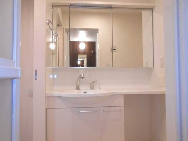 ��ʌ������s�������̃A�p�[�g�̐��ʏ�