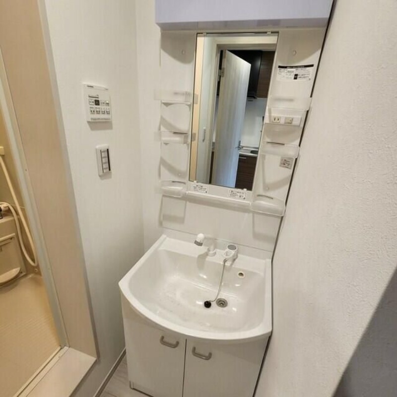 ��ʌ��������܎s�������a�c���Q���ڂ̃A�p�[�g�̐��ʏ�