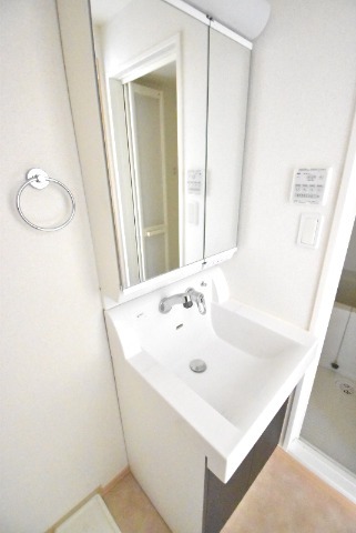 ��ʌ�����s������Q���ڂ̃}���V�����̐��ʏ�