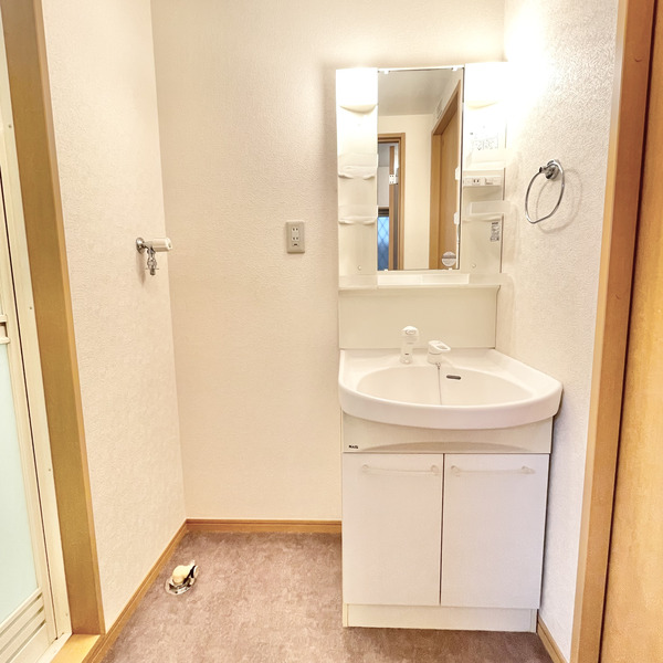 ��ʌ������s�����R���ڂ̃}���V�����̐��ʏ�