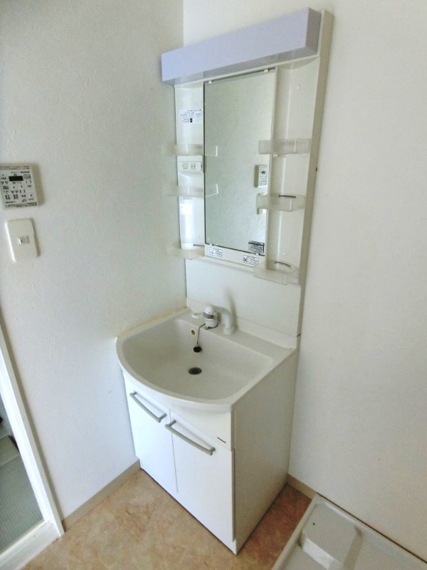 ��ʌ������s�����S���ڂ̃}���V�����̐��ʏ�